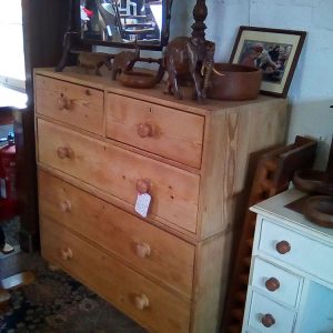 Pale wood chest on chest drawers