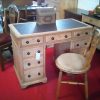 Antique pine desk with leather top and 9 drawers