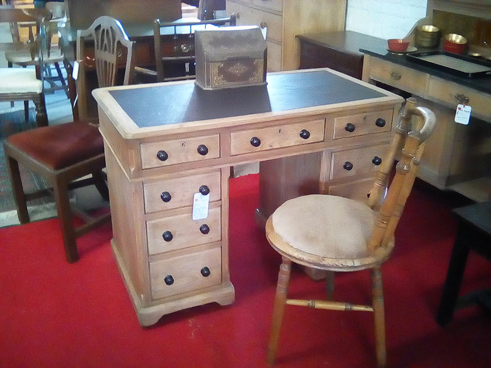 Antique pine desk with leather top and 9 drawers